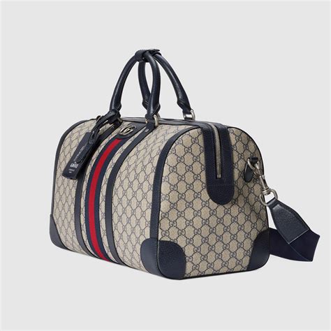 Malle Gucci Savoy en toile Supreme beige et bleue 